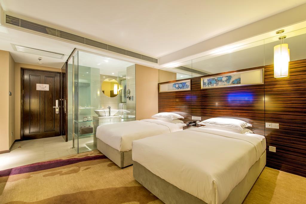 Longda Hotel Changchún Habitación foto