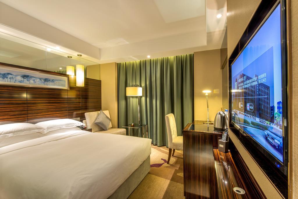 Longda Hotel Changchún Habitación foto