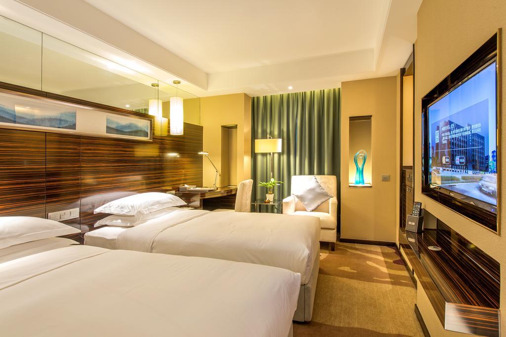 Longda Hotel Changchún Habitación foto