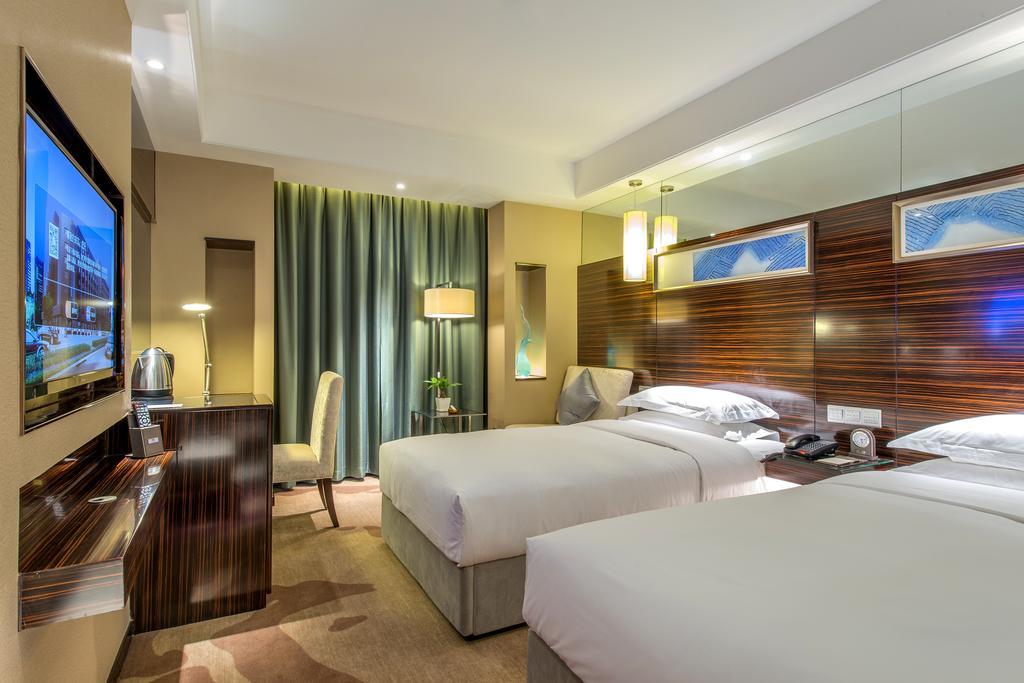 Longda Hotel Changchún Habitación foto